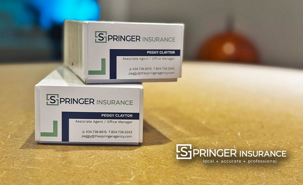 Peggy's new cards sit on Nicks desk ready to be delivered